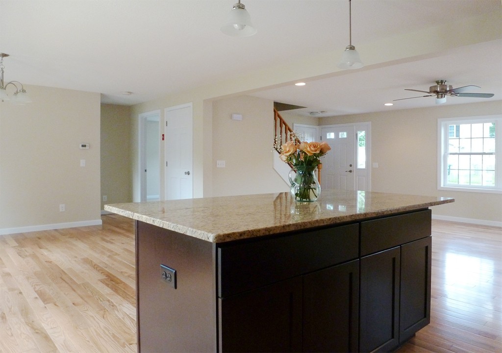 184 Ellsworth Avenue Springfield, MA 01118 - Photo 9 of 25 a kitchen with a sink a counter space and cabinets
