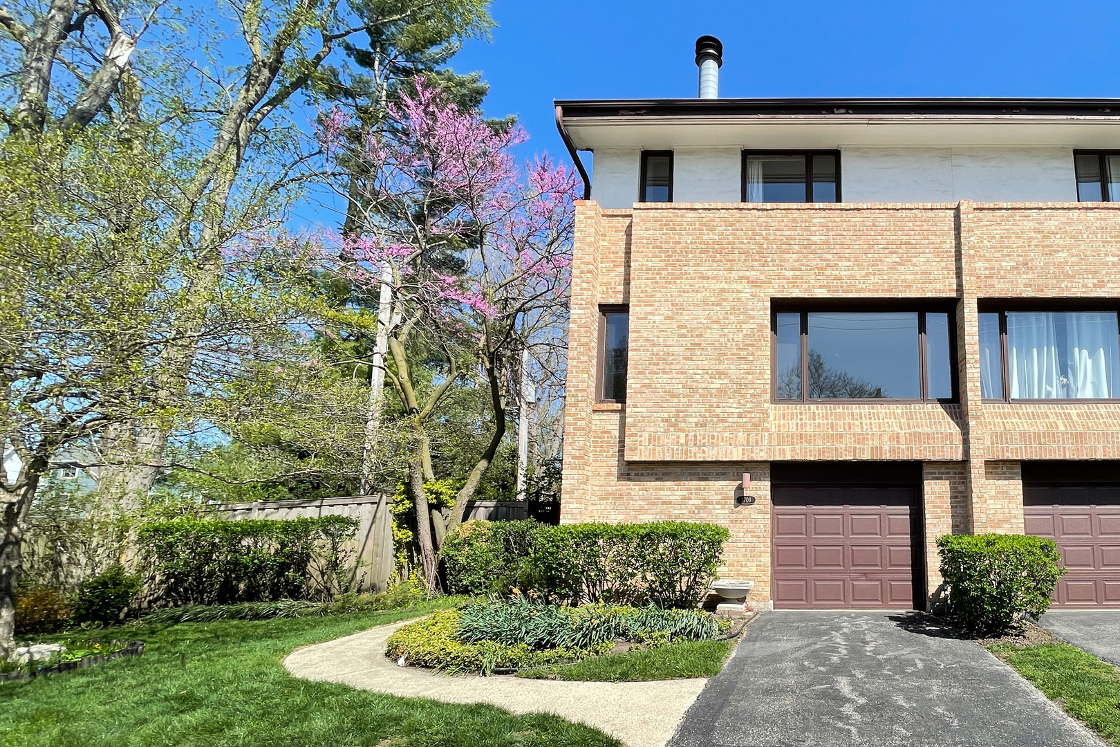 3709 Haas Avenue Riverside, IL 60546 - Photo 1 of 21 a front view of a house with a yard