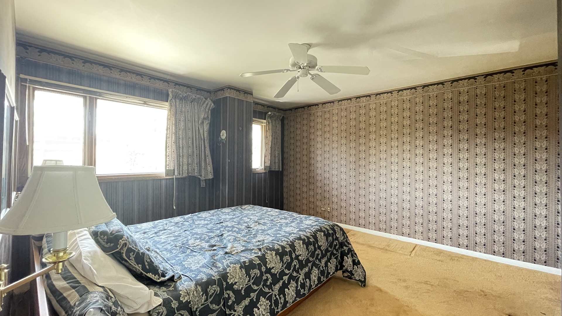 3709 Haas Avenue Riverside, IL 60546 - Photo 14 of 21 a bedroom with a bed and a chandelier