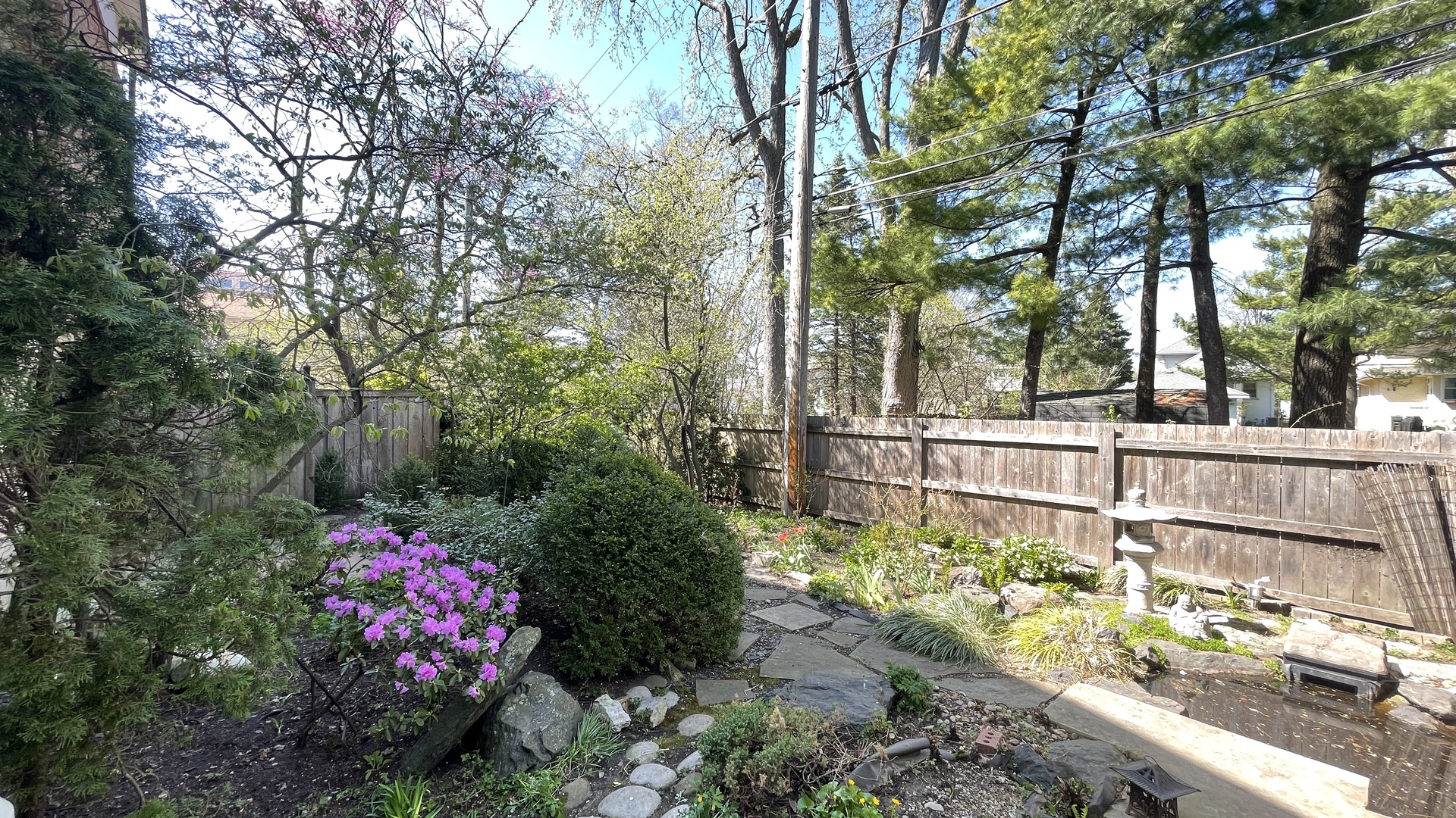 3709 Haas Avenue Riverside, IL 60546 - Photo 10 of 21 a view of a garden with flowers and trees