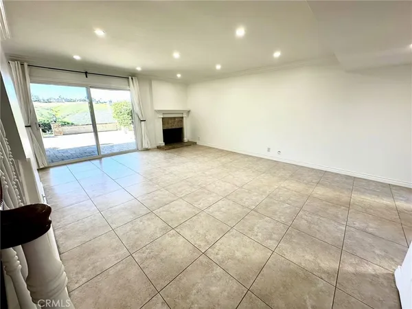 a view of a kitchen with a sink and cabinets