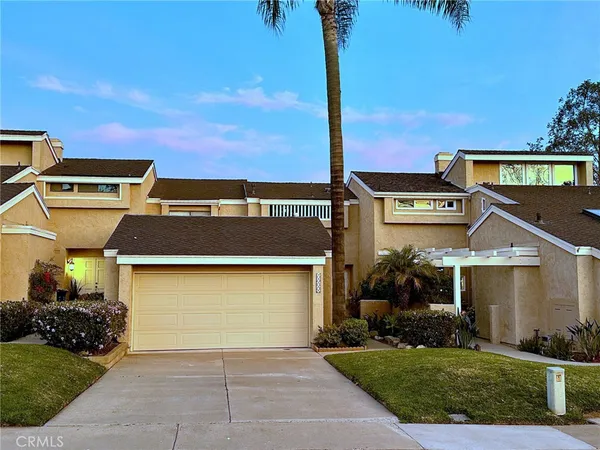 a view of a sign board with yard