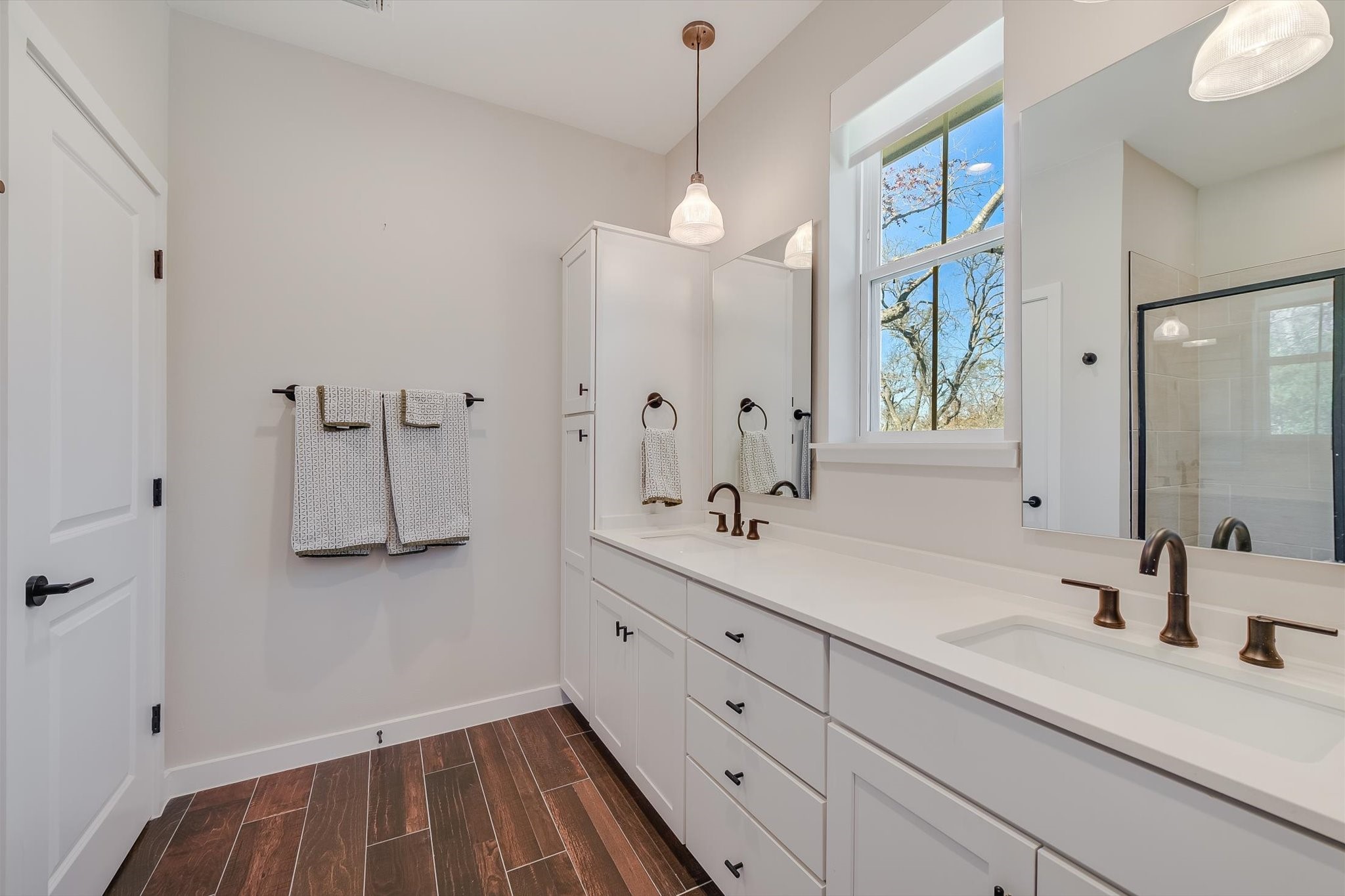 3809 Valley View Road, Unit 7 Austin, TX 78704 - Photo 13 of 21 Bathroom featuring vanity and a shower with door