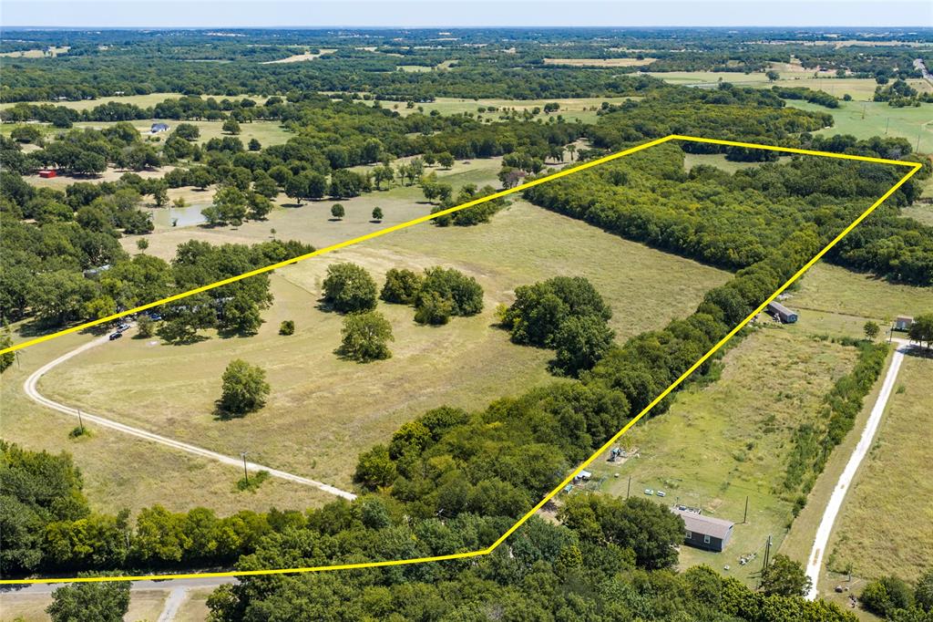 346 Smith Oak Road Sherman, TX 75090 - Photo 2 of 21 Native vegetation provides a natural habitat for an abundance of wildlife, further enhancing the peaceful countryside.