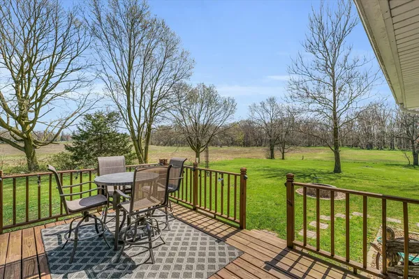 a view of a patio with a yard