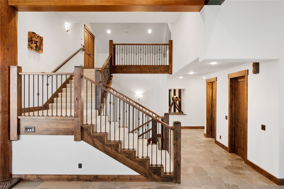 797 Ida Court Incline Village, NV 89451 - Photo 13 of 43 a view of staircase with lots of frames and frames on wall