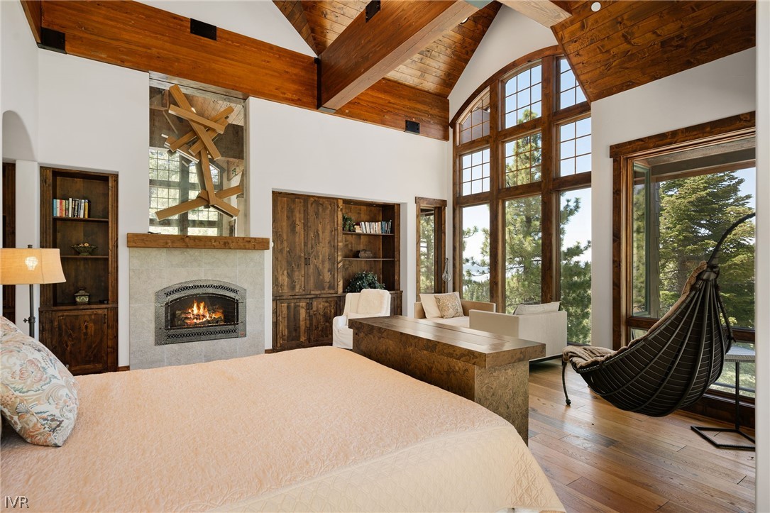 797 Ida Court Incline Village, NV 89451 - Photo 15 of 43 a view of a livingroom with furniture wooden floor fireplace and windows