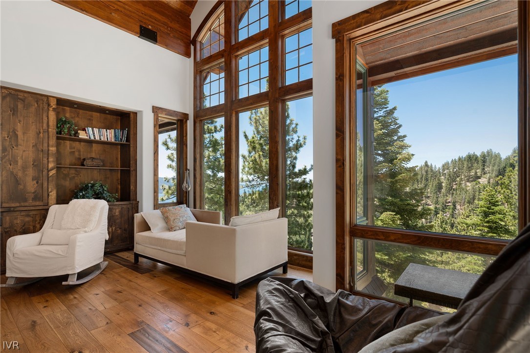 797 Ida Court Incline Village, NV 89451 - Photo 16 of 43 a living room with furniture and a floor to ceiling window