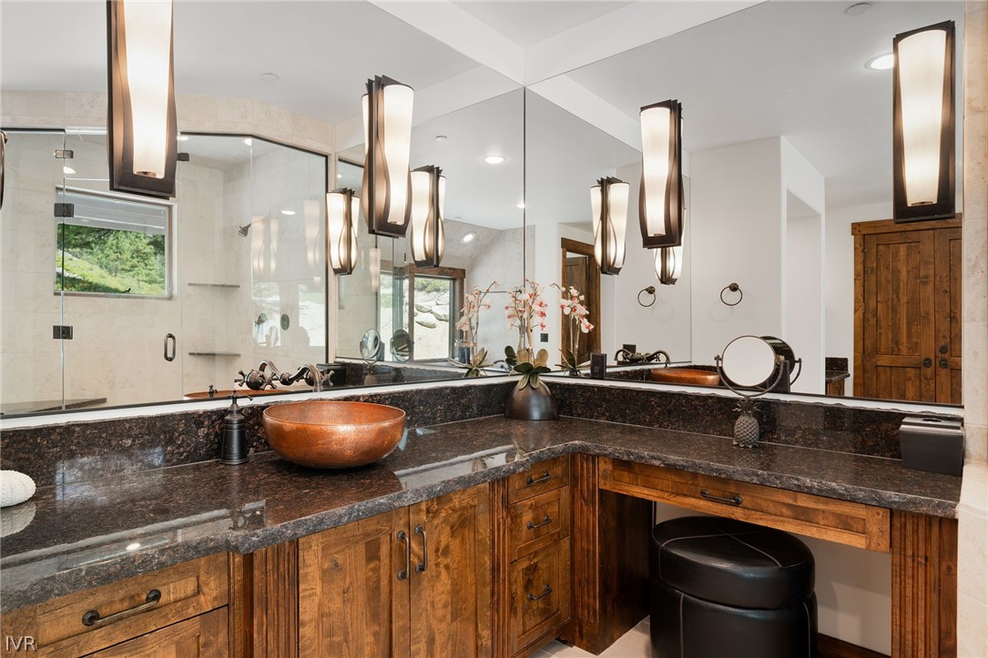 797 Ida Court Incline Village, NV 89451 - Photo 17 of 43 a kitchen with stainless steel appliances granite countertop a sink a stove and cabinets