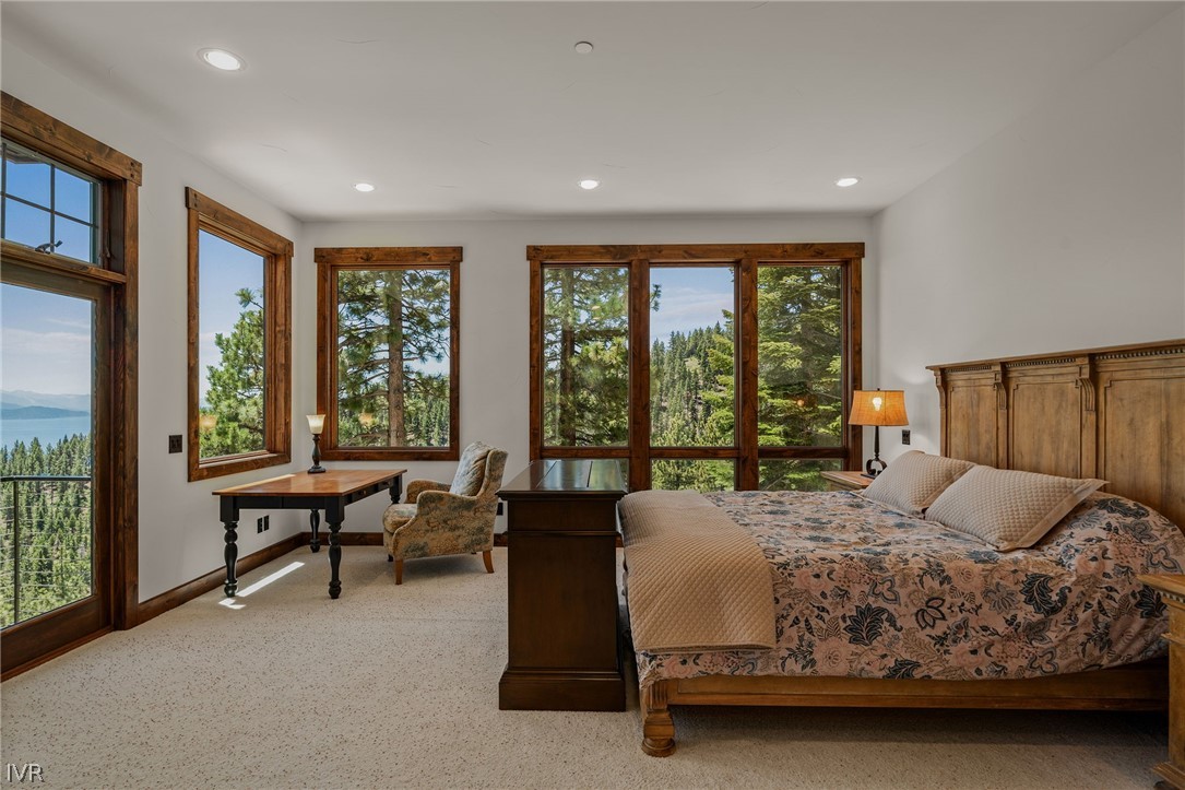 797 Ida Court Incline Village, NV 89451 - Photo 20 of 43 a bedroom with a bed and a large window