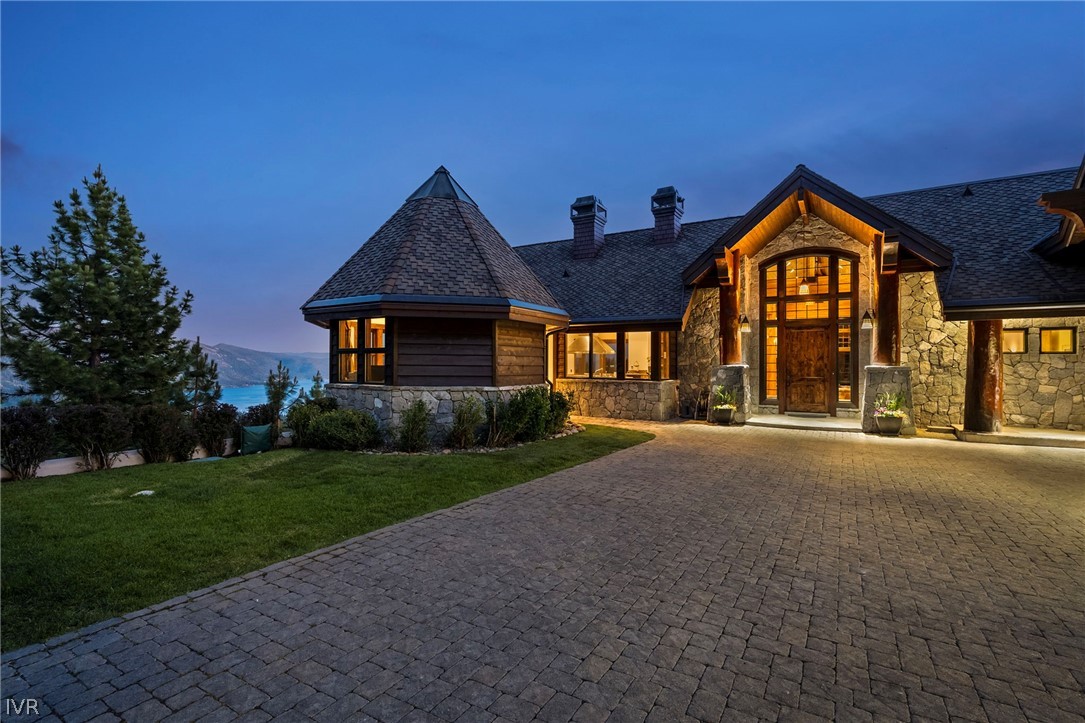 797 Ida Court Incline Village, NV 89451 - Photo 2 of 43 a front view of a house with yard and green space