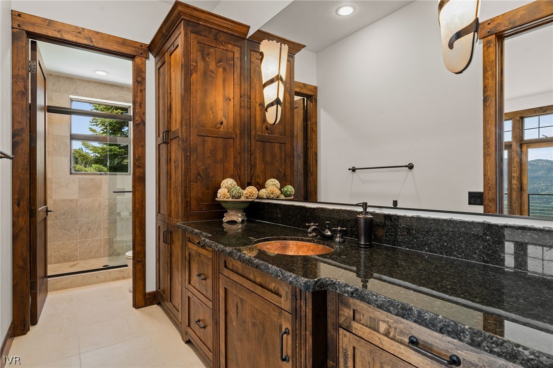 797 Ida Court Incline Village, NV 89451 - Photo 22 of 43 a bathroom with a sink and a mirror