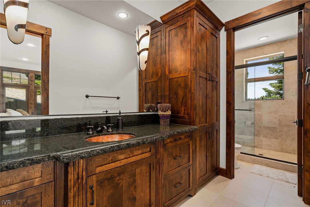 797 Ida Court Incline Village, NV 89451 - Photo 24 of 43 a bathroom with a sink and a mirror