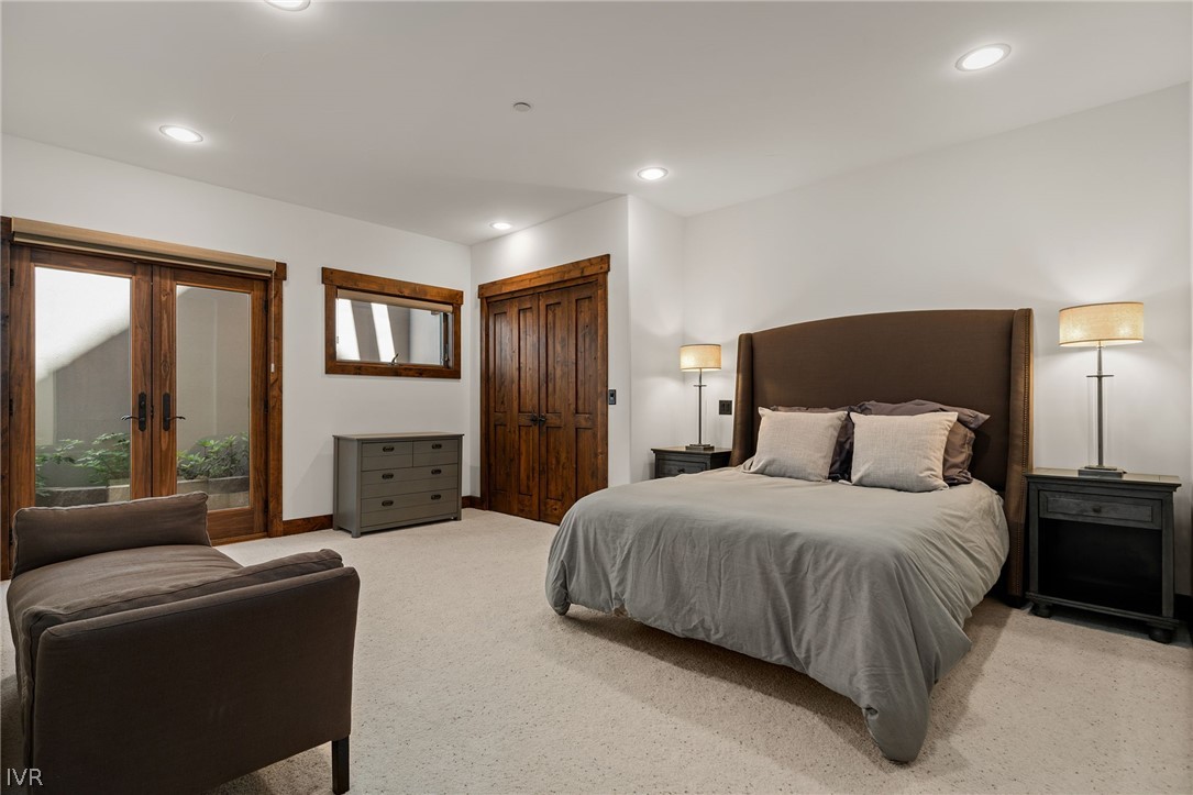 797 Ida Court Incline Village, NV 89451 - Photo 40 of 43 a bedroom with a large bed and a couch