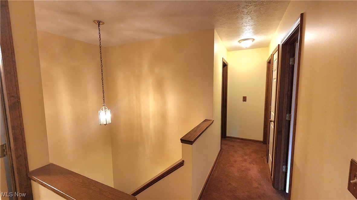 15446 Roxboro Drive Cleveland, OH 44130 - Photo 10 of 20 Second floor landing/hallway