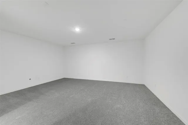 an empty room with a natural light