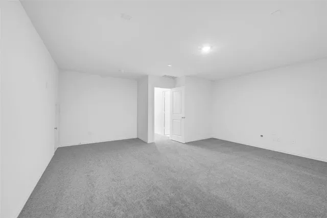 a bathroom with a sink a toilet a mirror a bathtub and shower