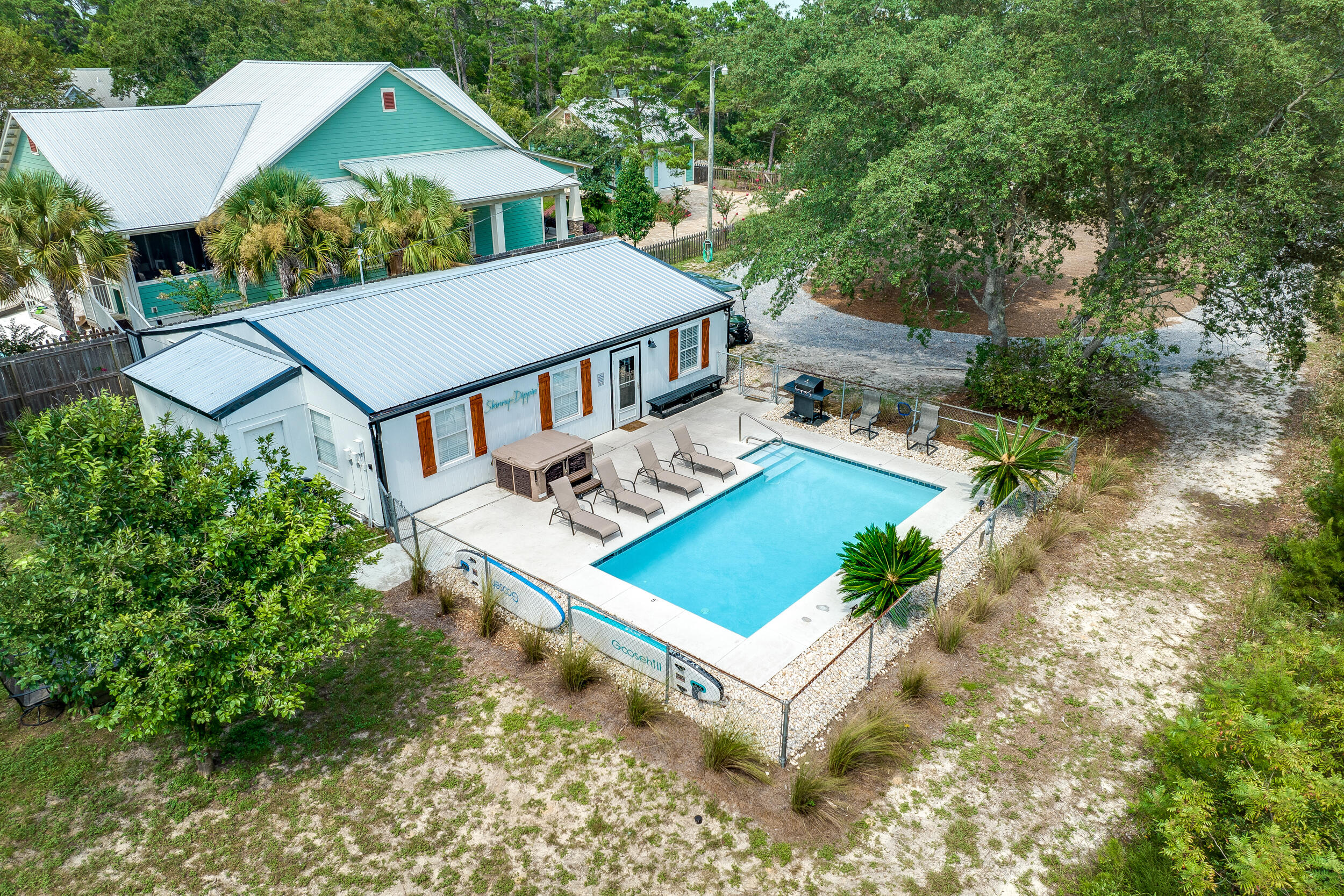 481 North Orange Street Inlet Beach, FL 32461 - Photo 1 of 57 an aerial view of a house with swimming pool and patio