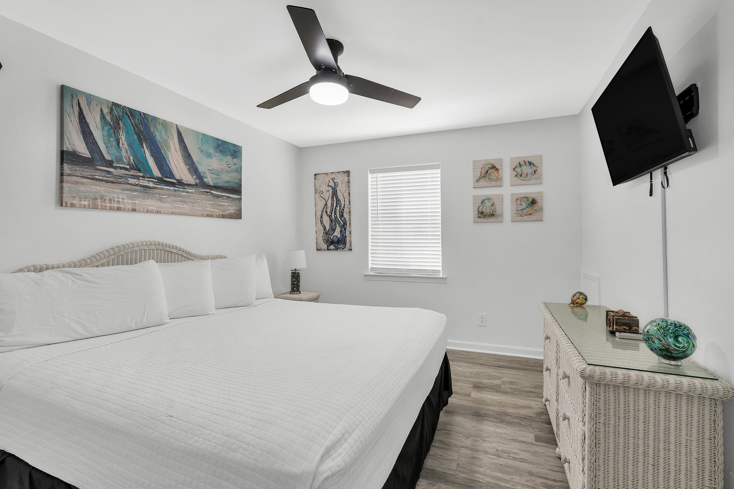 481 North Orange Street Inlet Beach, FL 32461 - Photo 23 of 57 a bedroom with a bed and a flat screen tv