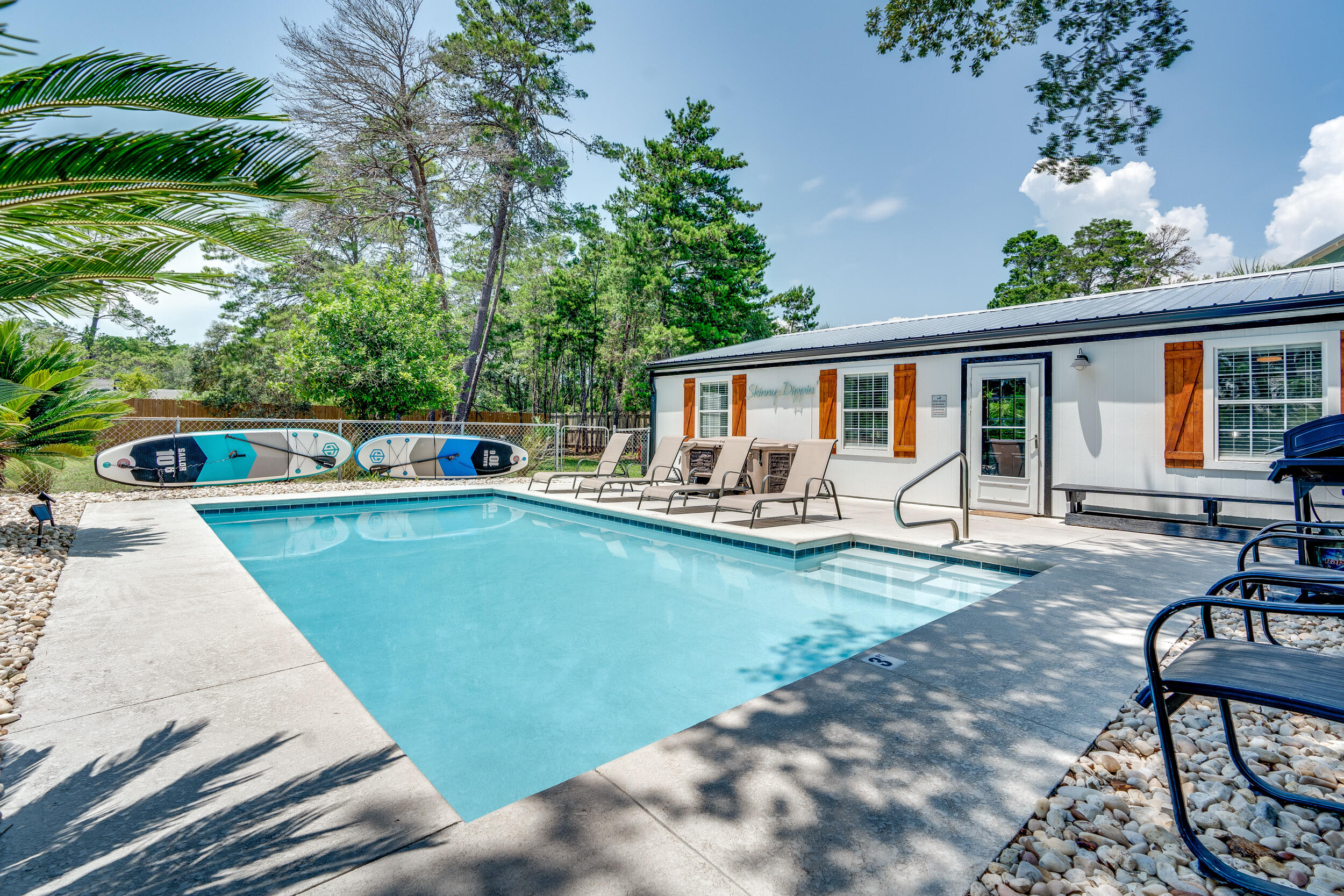 481 North Orange Street Inlet Beach, FL 32461 - Photo 3 of 57 a view of a swimming pool with chairs