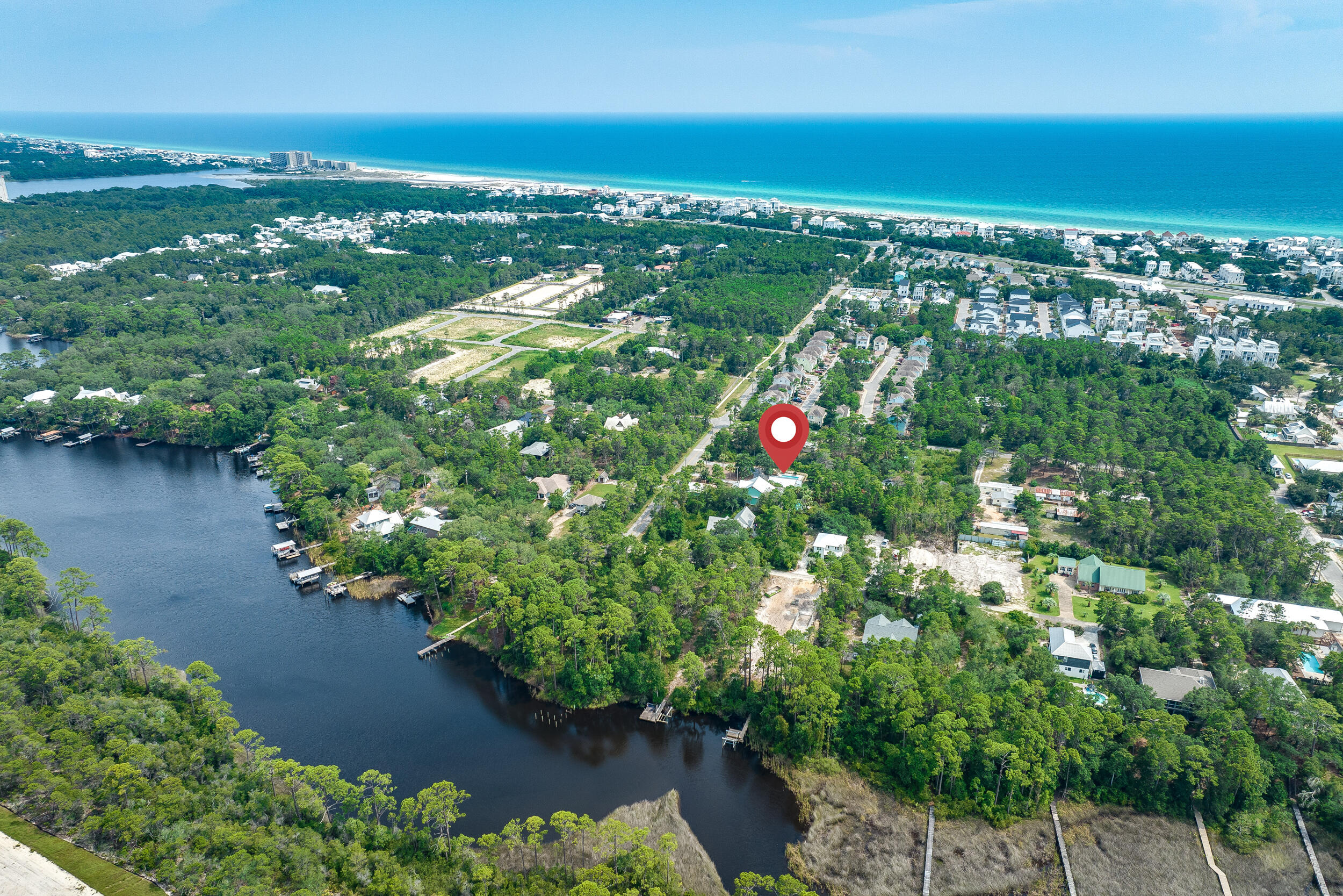 481 North Orange Street Inlet Beach, FL 32461 - Photo 34 of 57 a view of a lake with a city