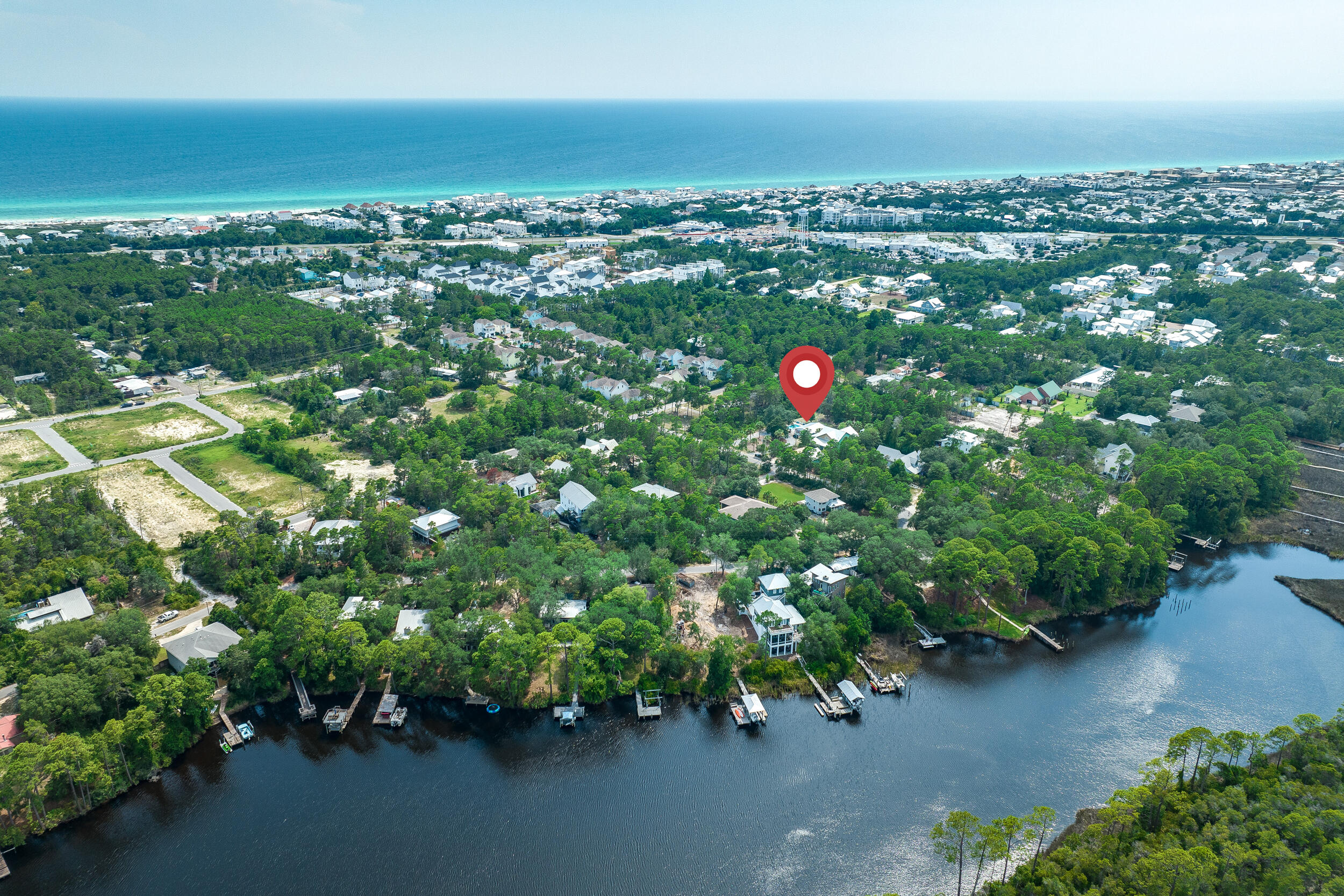 481 North Orange Street Inlet Beach, FL 32461 - Photo 35 of 57 an aerial view of a houses with an outdoor space and seating area