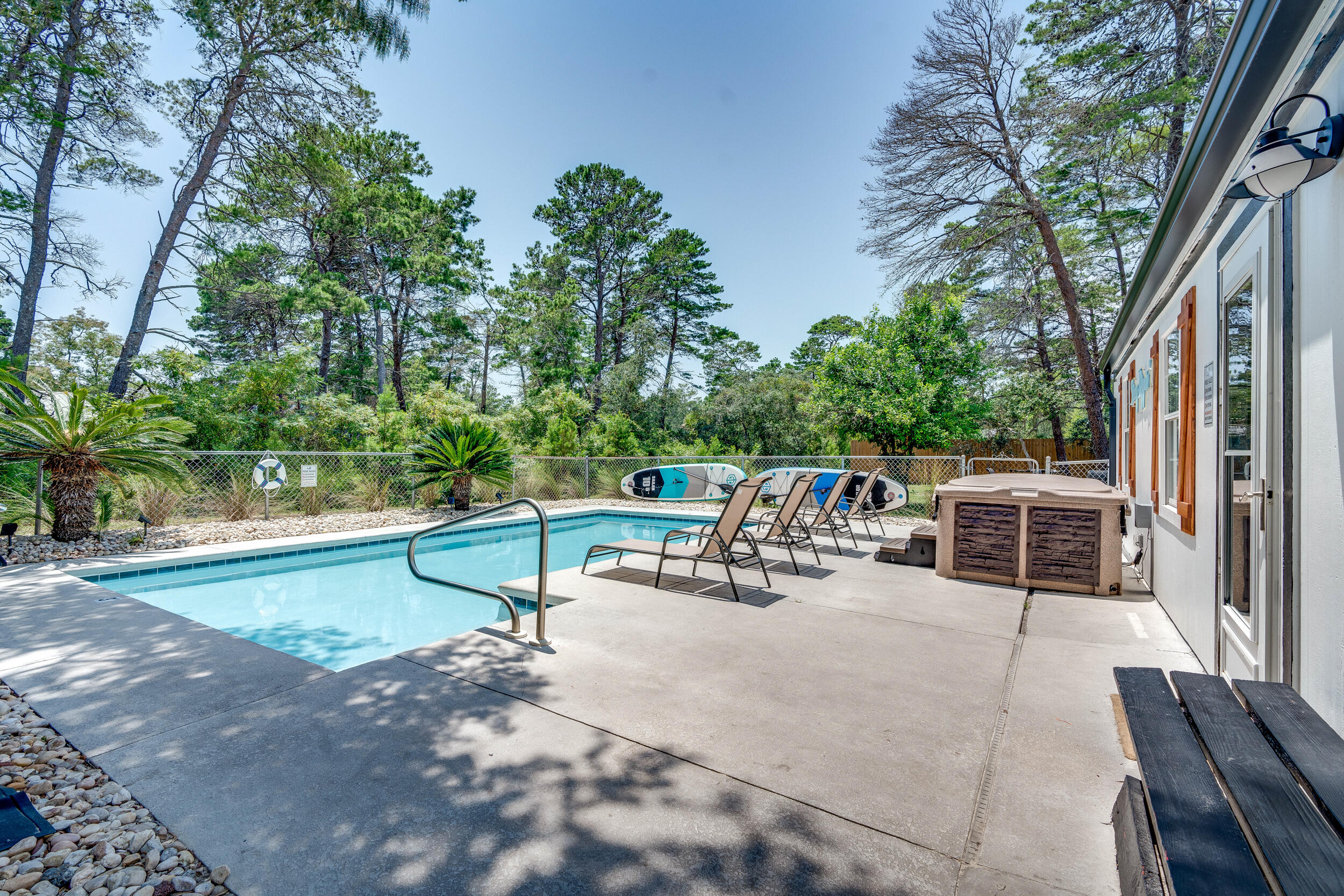 481 North Orange Street Inlet Beach, FL 32461 - Photo 45 of 57 a view of a patio with a table and chairs