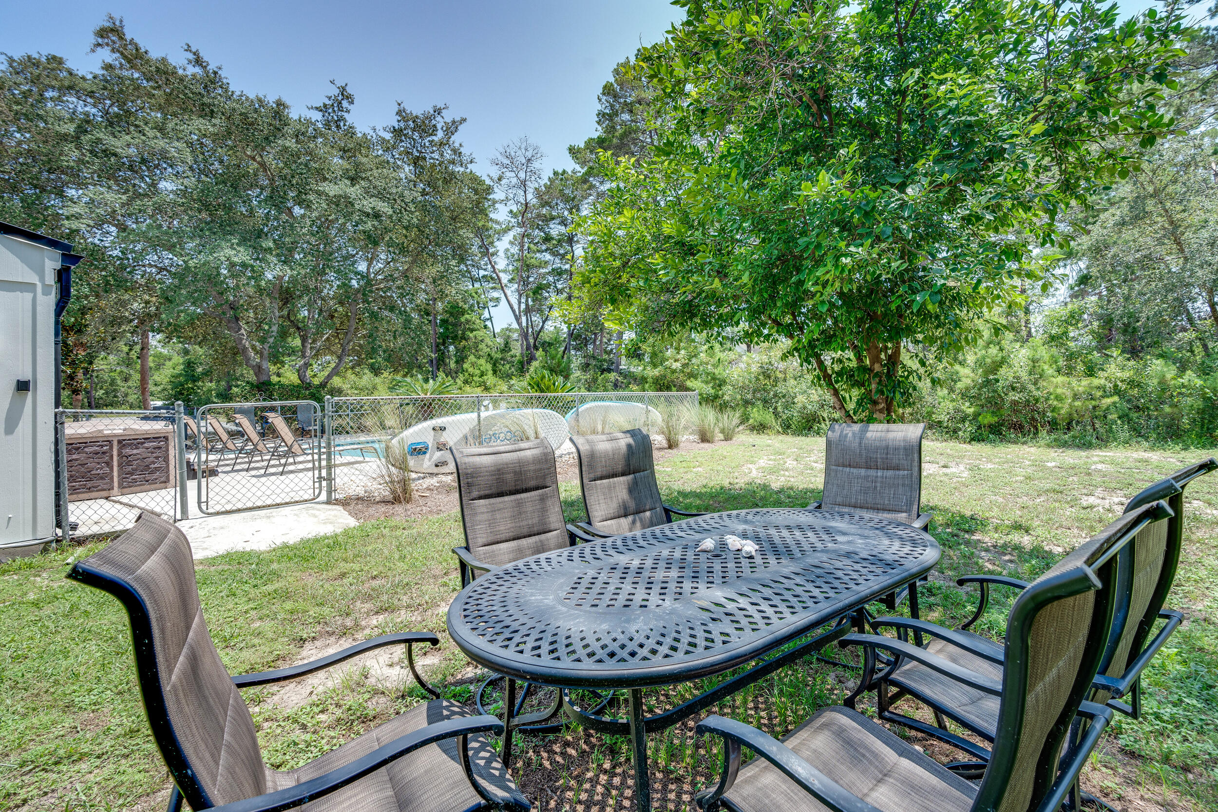 481 North Orange Street Inlet Beach, FL 32461 - Photo 48 of 57 a view of a table and chairs in the patio