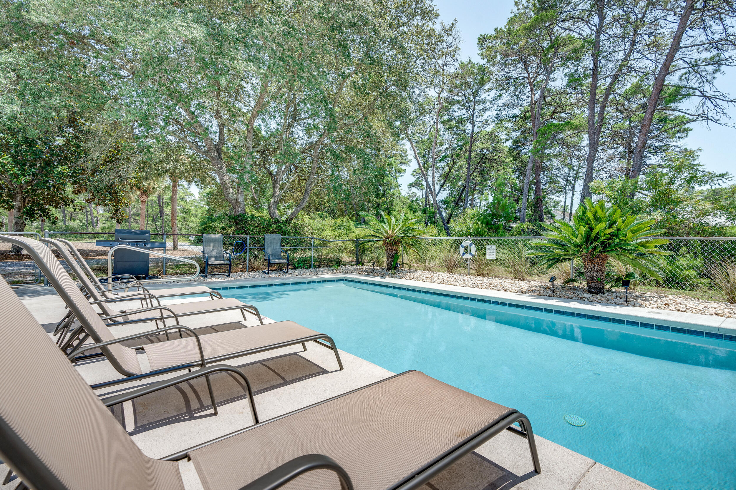 481 North Orange Street Inlet Beach, FL 32461 - Photo 5 of 57 a view of a backyard with sitting area