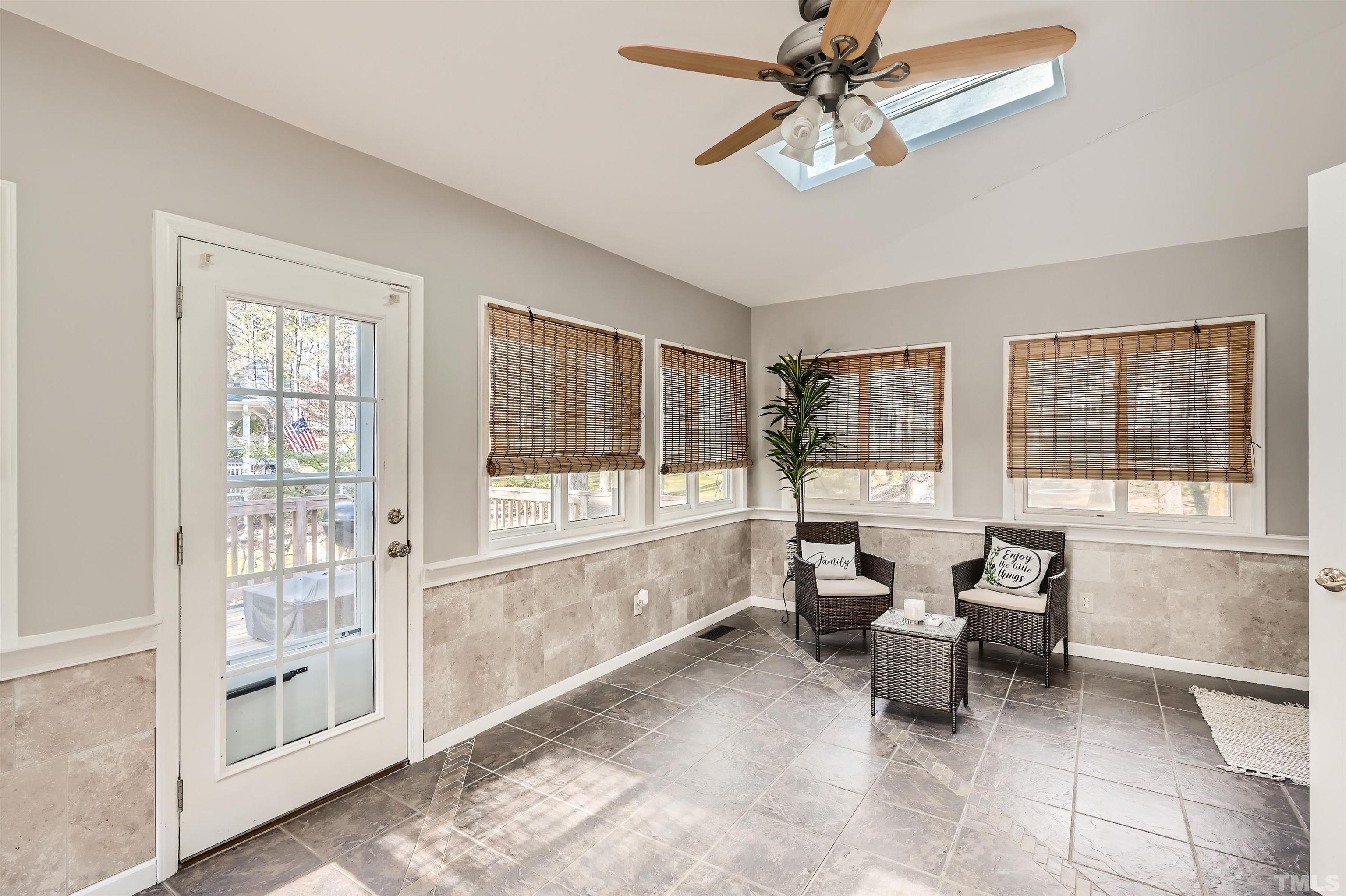 1705 Reynolda Court Raleigh, NC 27603 - Photo 23 of 28 a living room with furniture and a large window