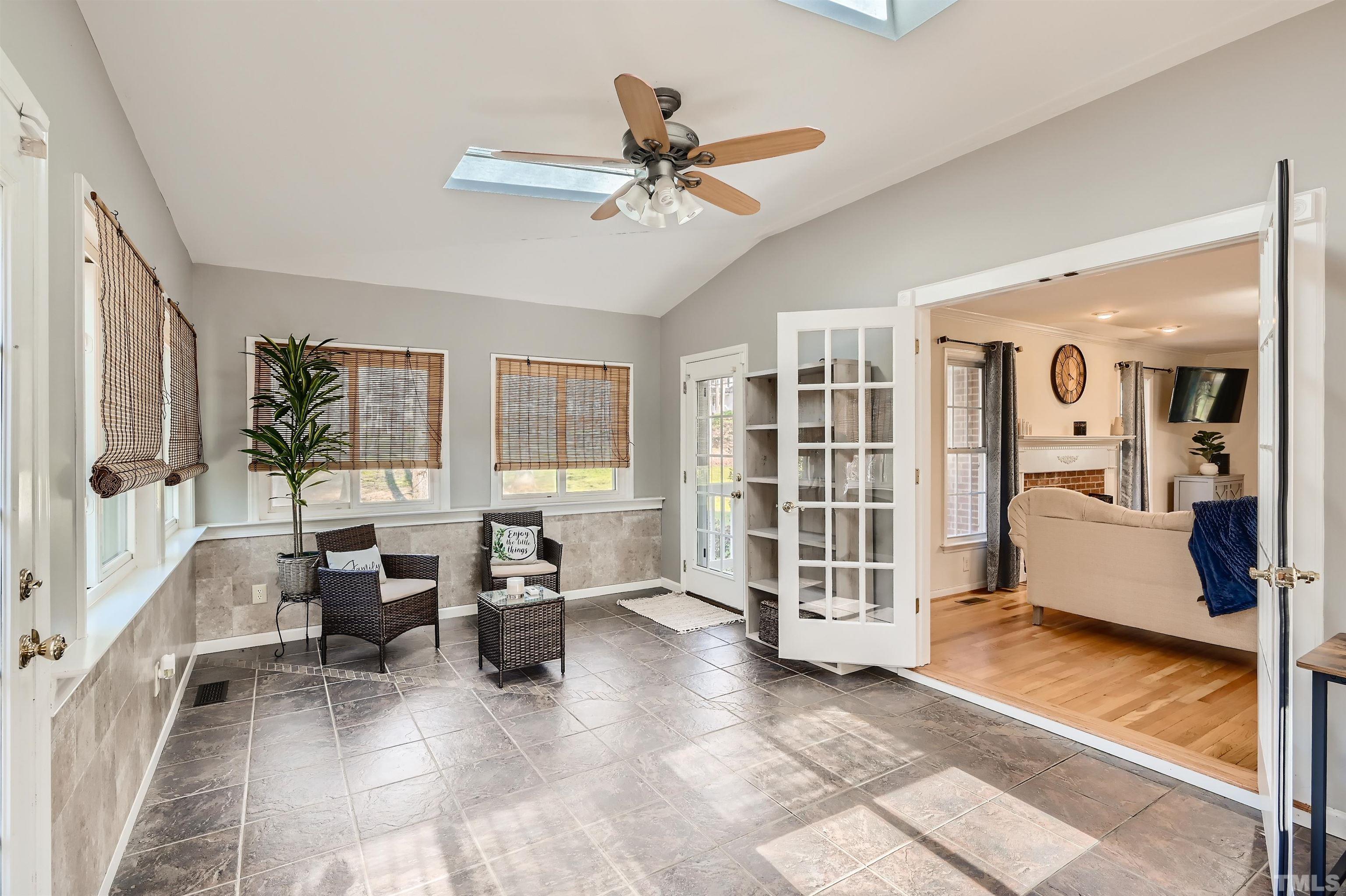 1705 Reynolda Court Raleigh, NC 27603 - Photo 24 of 28 a living room with furniture and a window
