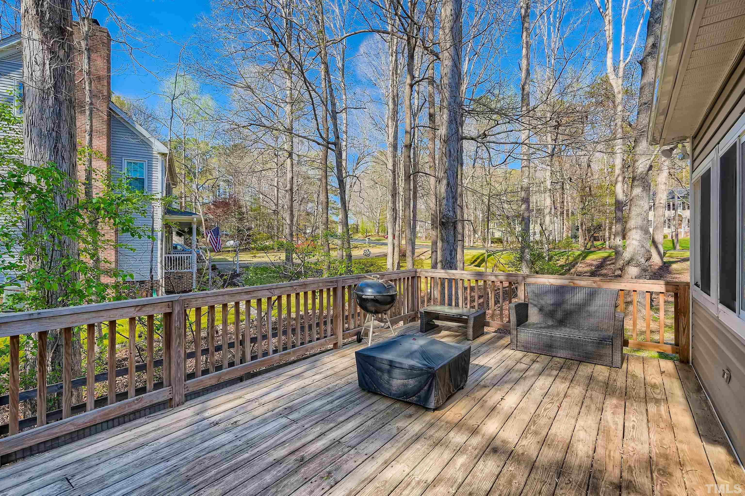 1705 Reynolda Court Raleigh, NC 27603 - Photo 25 of 28 a view of balcony with couch and wooden floor