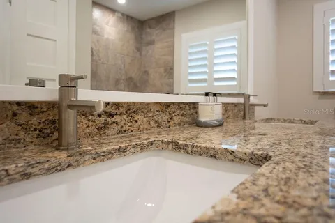 a view of a backyard with a patio