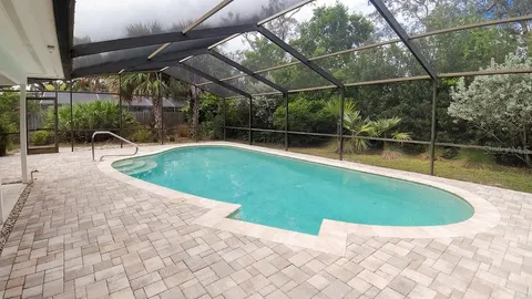 a view of outdoor space with swimming pool