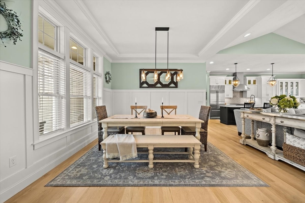 34 Palmer River Road Swansea, MA 02777 - Photo 11 of 42 a living room with a couch a table and kitchen view