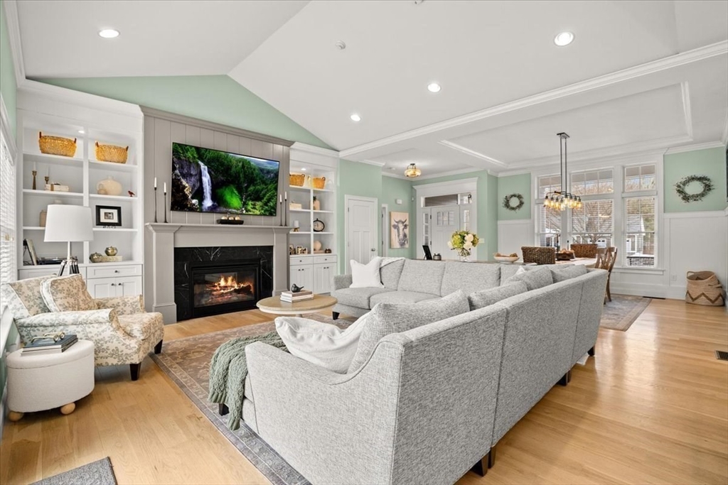 34 Palmer River Road Swansea, MA 02777 - Photo 22 of 42 a living room with furniture and a fireplace