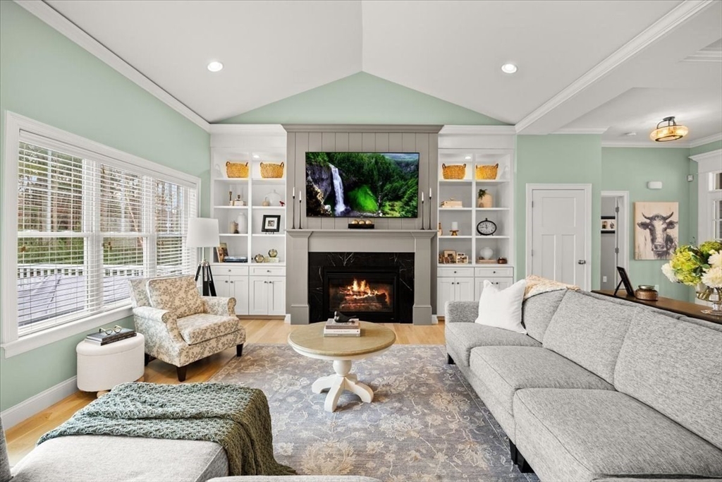 34 Palmer River Road Swansea, MA 02777 - Photo 23 of 42 a living room with furniture large window and a fireplace