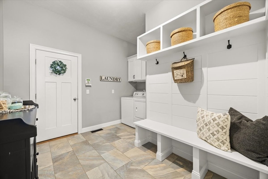 34 Palmer River Road Swansea, MA 02777 - Photo 28 of 42 a living room with furniture and a flat screen tv