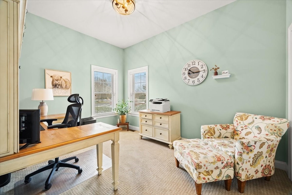 34 Palmer River Road Swansea, MA 02777 - Photo 39 of 42 a bedroom with furniture and a wooden floor