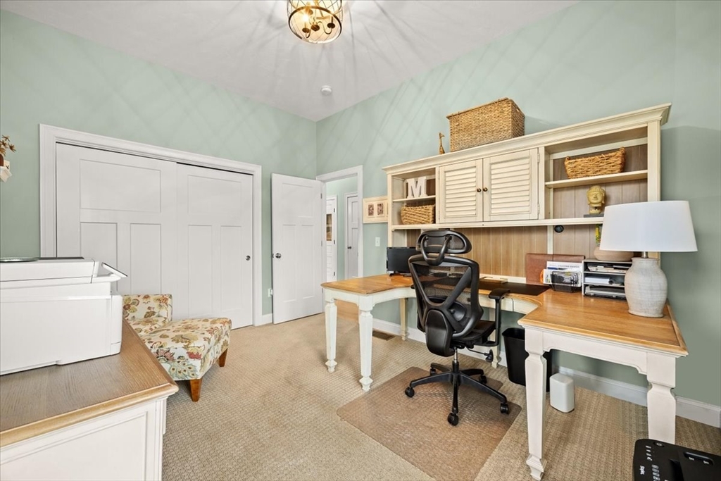34 Palmer River Road Swansea, MA 02777 - Photo 40 of 42 a view of a workspace with furniture and a window