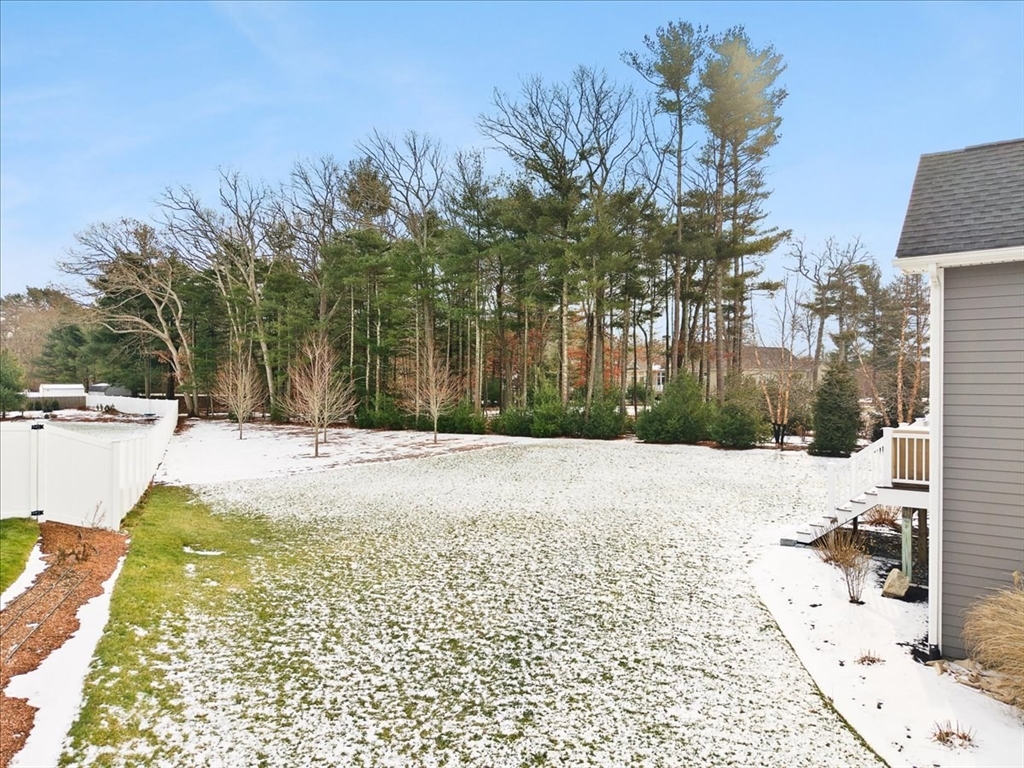 34 Palmer River Road Swansea, MA 02777 - Photo 6 of 42 a swimming pool with an outdoor space and seating area