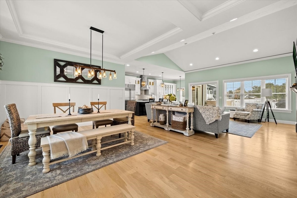 34 Palmer River Road Swansea, MA 02777 - Photo 10 of 42 a living room with furniture a rug and a flat screen tv