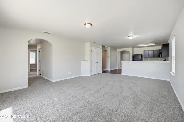 a view of a kitchen with a sink