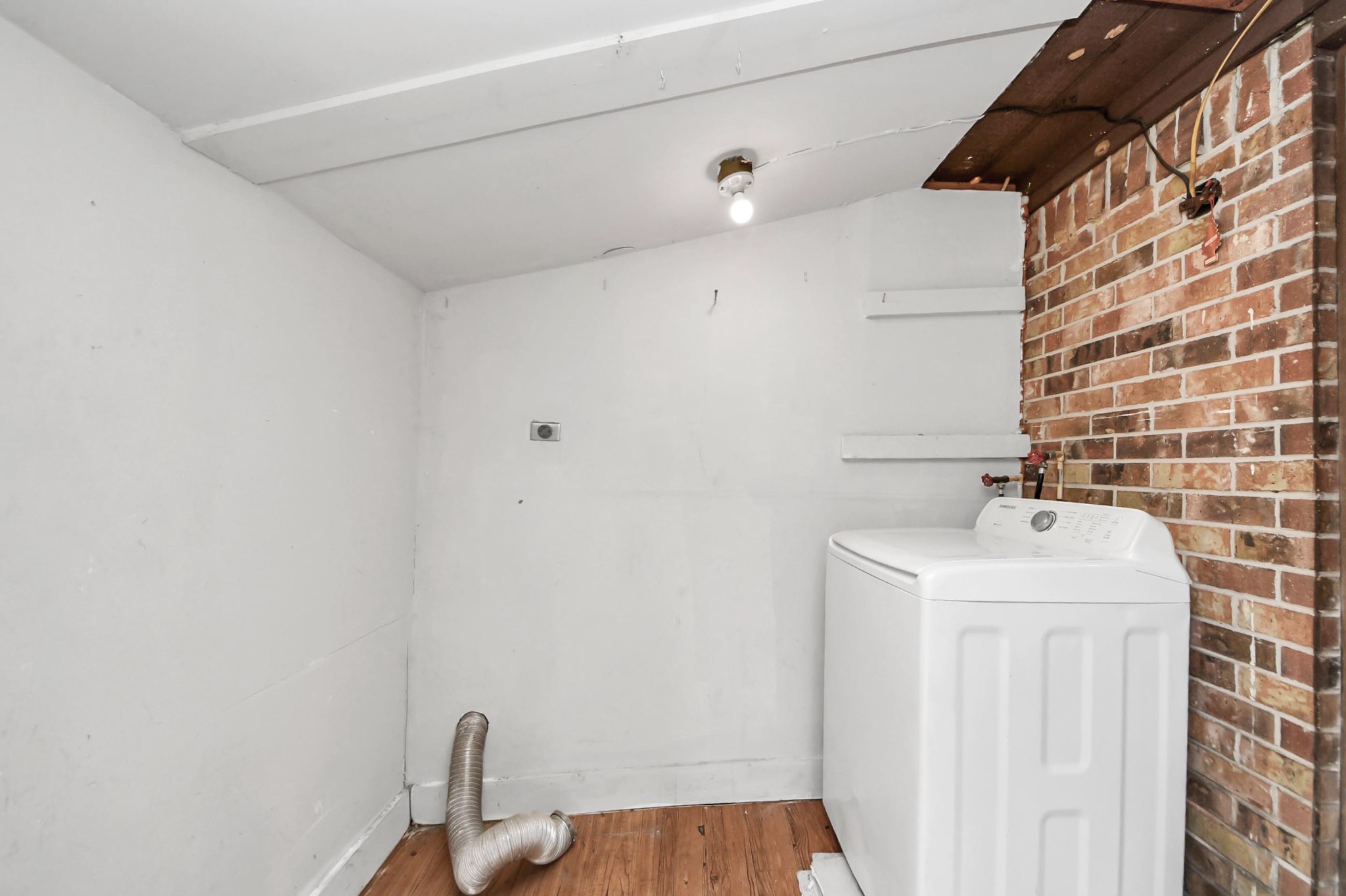 1006 Perry Street, Unit 100 Cleveland, TX 77327 - Photo 25 of 38 a bathroom with a sink a toilet and shower