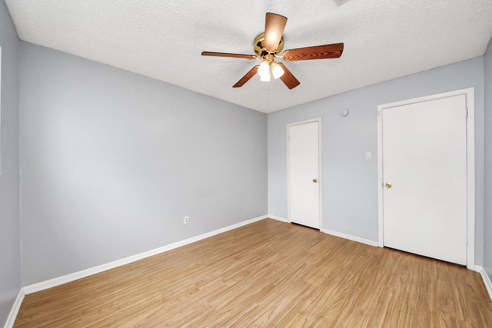 1006 Perry Street, Unit 100 Cleveland, TX 77327 - Photo 34 of 38 wooden floor in an empty room