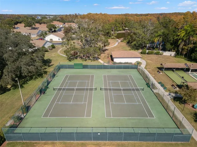 a view of a two chairs in the balcony