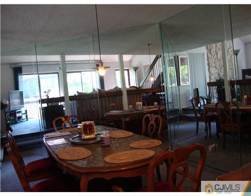 476 Westgate Drive Edison, NJ 08820 - Photo 4 of 10 a view of a dining room with furniture