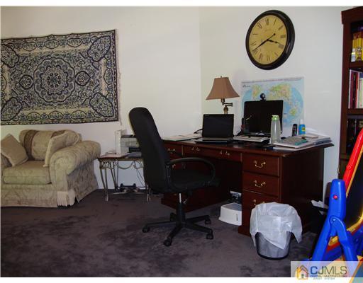 476 Westgate Drive Edison, NJ 08820 - Photo 6 of 10 a view of a workspace with furniture