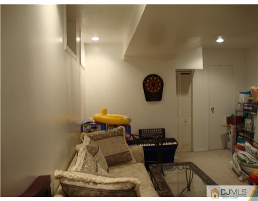 476 Westgate Drive Edison, NJ 08820 - Photo 10 of 10 a living room with furniture and a rug