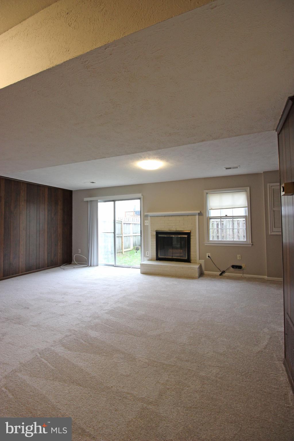 8022 Northumberland Road Springfield, VA 22153 - Photo 17 of 42 a view of empty room with a fireplace